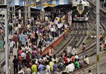 passengers block railway tracks in kolkata