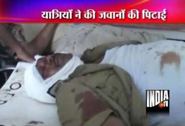 passengers bash up railway constables on train