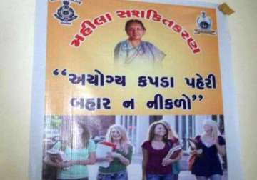 porbandar police remove posters advising conservative dressing