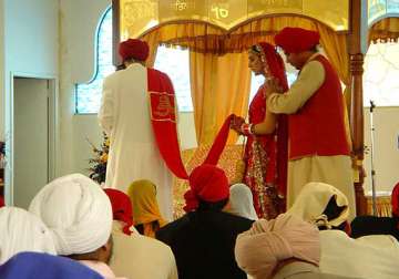 president signs bill on sikh marriage registration