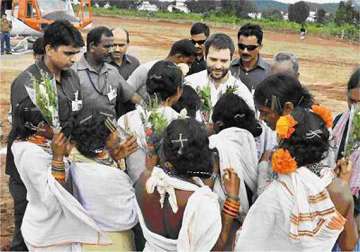 rahul gandhi listens to tribal women party workers in jharkhand