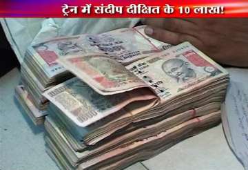 railway attendant finds rs 10 lakh cash from sheila dikshit s son s coupe sandip says this is my friend s money