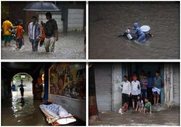 rains disrupt life in mumbai watch pics