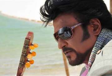 rajni fans eat rice spread on floor for his recovery