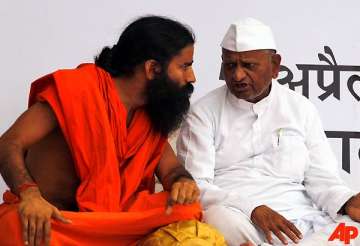 ramdev backtracks says no problem with bhushans on the panel
