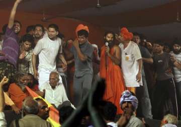 ramdev says his fast continues gives call for black day