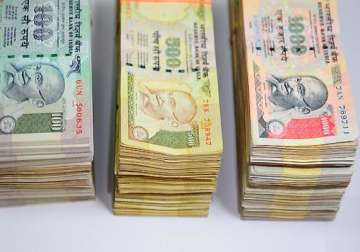 rs 2.2 crore cash haul in bangalore 9 held