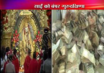 rs 2.4 cr cash gold silver donated to shirdi sai baba on guru poornima