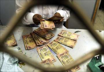 rupee slid further after passage of food security bill tmc