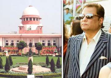 sit to probe black money centre asks sc to review order