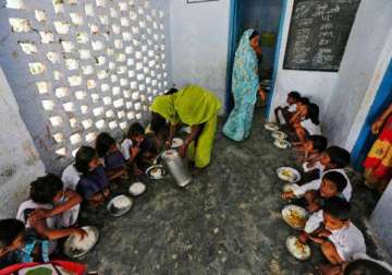 school headmistress booked for burying mid day meal rice