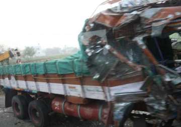 seven dead 14 injured as two trucks collide in up