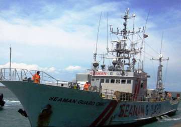 ship carrying arms and security guards detained coast guard