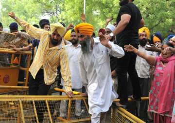 sikh groups protest near parliament