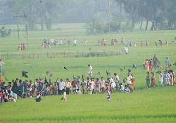 singur farmers celebrate issue of ordinance to return land