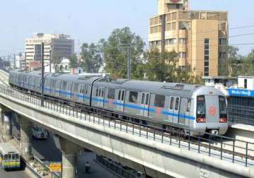 delhi metro train runs with open doors operator suspended