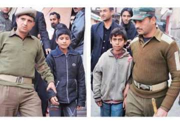 srinagar police handcuff kids march them to court judge says take them off