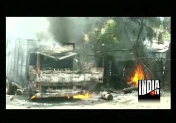 stoning arson in up town after customer s scuffle with bank of india manager