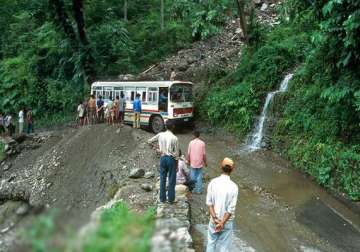 stranded tourists in sikkim safely cross road after twin landslides