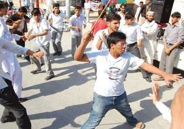 students block road protest against faulty inter results