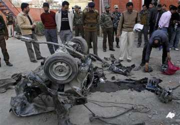 suspected militant killed 20 people injured in j k car blast