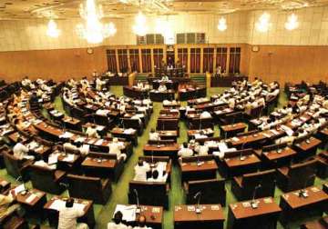 telangana legislators on sit in evicted from andhra assembly