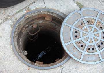 three year old girl dies after falling into open manhole