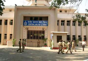 tihar jail assistant superintendent suspended for taking bribe