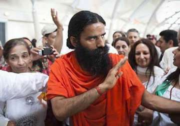 trinamool minister objects to cabinet ministers going to airport to meet ramdev