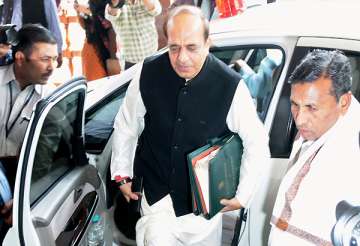 trivedi attends parliament parries questions on resignation