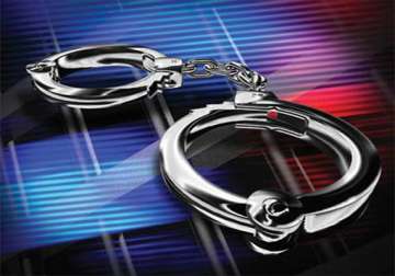 two persons trying to extort money held