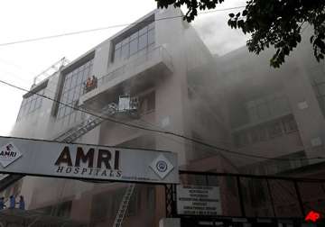 two eminent kolkata doctors arrested for amri hospital fire
