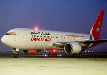 tyres of oman air flight burst while being taxied to bay