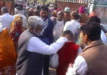 up minister slaps punches party worker
