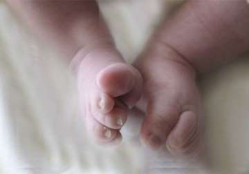 unable to pay bribe woman delivers baby at bus stand in tn