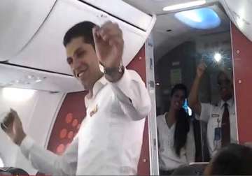 watch spicejet cabin crew spicing up holi with dance inside aircraft aisle airlines gets dgca notice