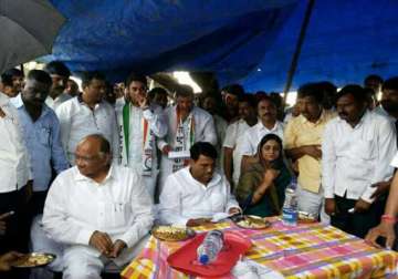 watch pic of sharad pawar munching dry fruits while meeting hailstorm hit farmers