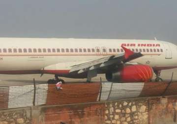 watch pics of air india airbus crashlanding in jaipur with wing broken burst tyre