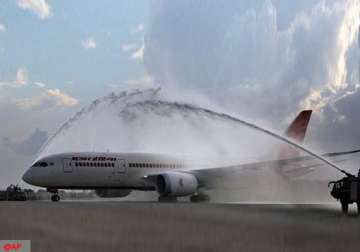 water cannon salute given as dreamliner lands in delhi