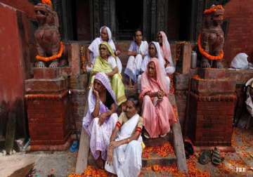 widows of varanasi preparing rakhis for brother modi