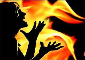 woman sets herself two kids ablaze in up