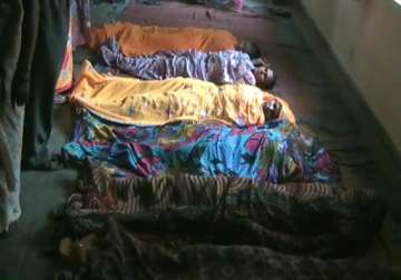 women lie on floor in mathura after undergoing tubectomy surgeries