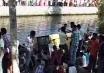 4 school kids die 15 go missing as bus falls into canal