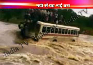 2 dead 3 missing after bus is washed away