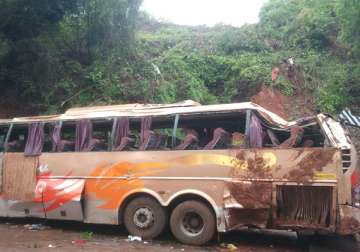 2 killed as mumbai goa tourist volvo bus falls on hilly slope
