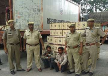 160 cartons of illicit liquor seized one held