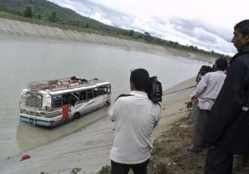 21 dead as bus falls into canal in up