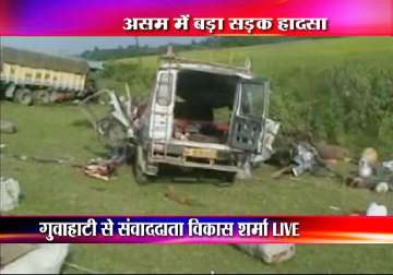 31 people dead as truck hits two vans in assam