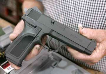 22 pistols seized three held in delhi