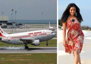 two air india pilots suspended for allowing south actress nithya menon inside cockpit